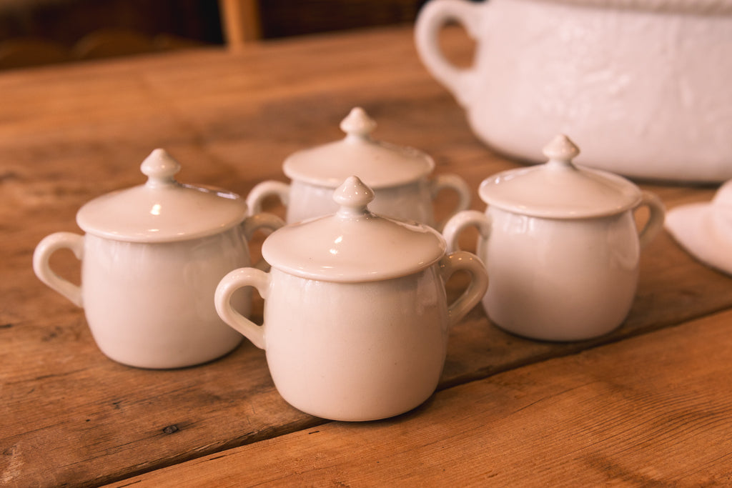 Set of Four French Porcelain Covered Pots