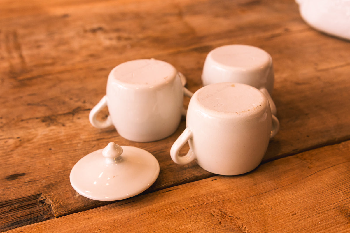 Set of Four French Porcelain Covered Pots